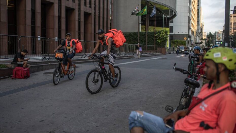 x Workers ride bicycles while making Rappi app deliveries in Sao Paulo Brazil on Wednesday Ap jpg pagespeed ic PBEKzH