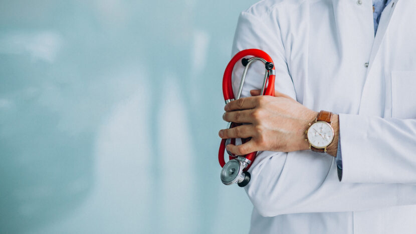 young handsome physician medical robe with stethoscope