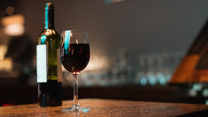 glass red wine bottle bar counter