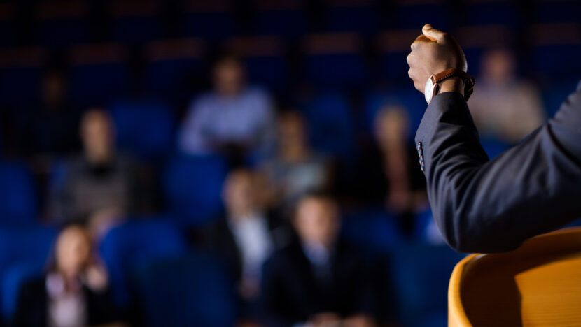 male business executive giving speech