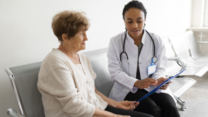 medium shot doctor talking patient