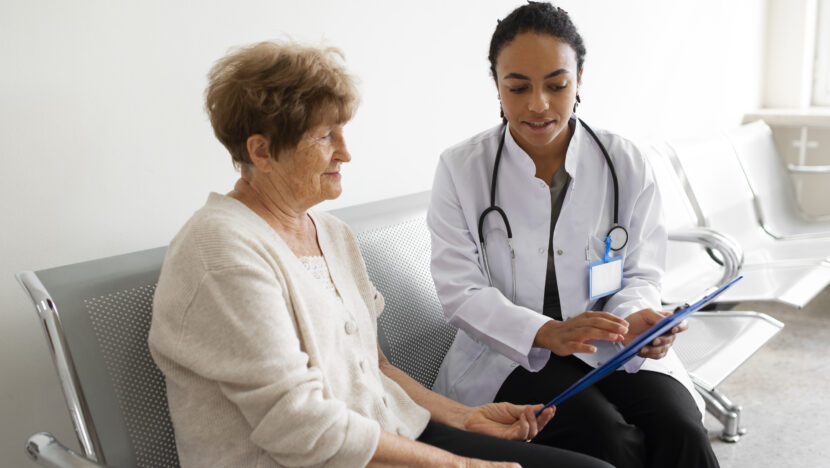 medium shot doctor talking patient