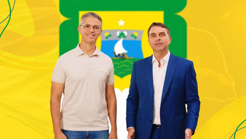 Dois homens posam lado a lado diante de fundo amarelo com a bandeira do RN