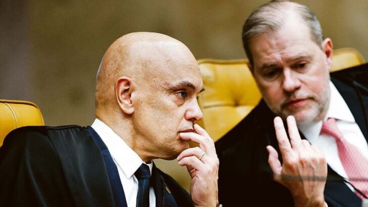 Dois ministros de toga preta sentados lado a lado em sessão do Supremo Tribunal Federal