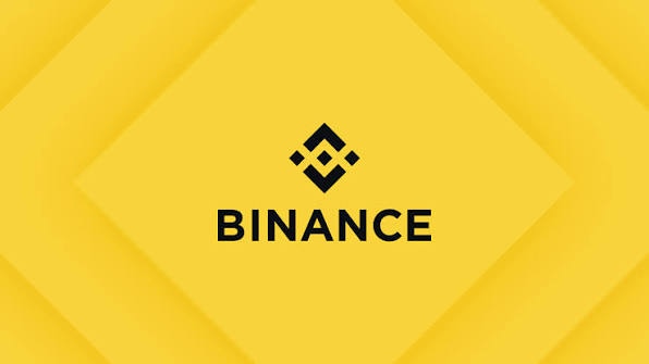 Símbolo e nome da Binance em preto sobre fundo amarelo com formas geométricas